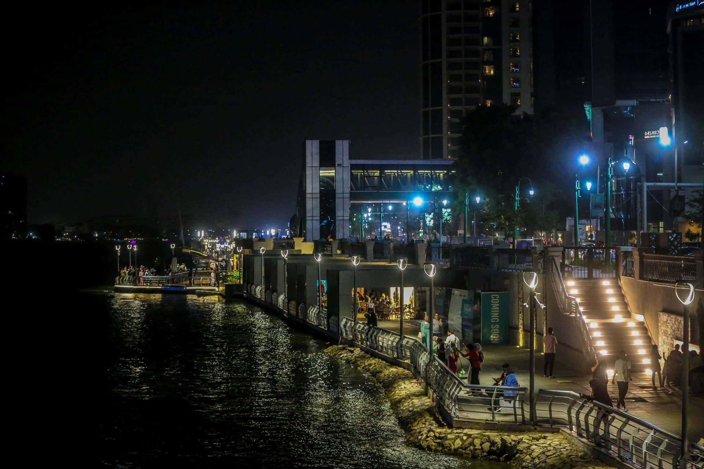Cairo’s Nile riverside promenade and city buildings at night