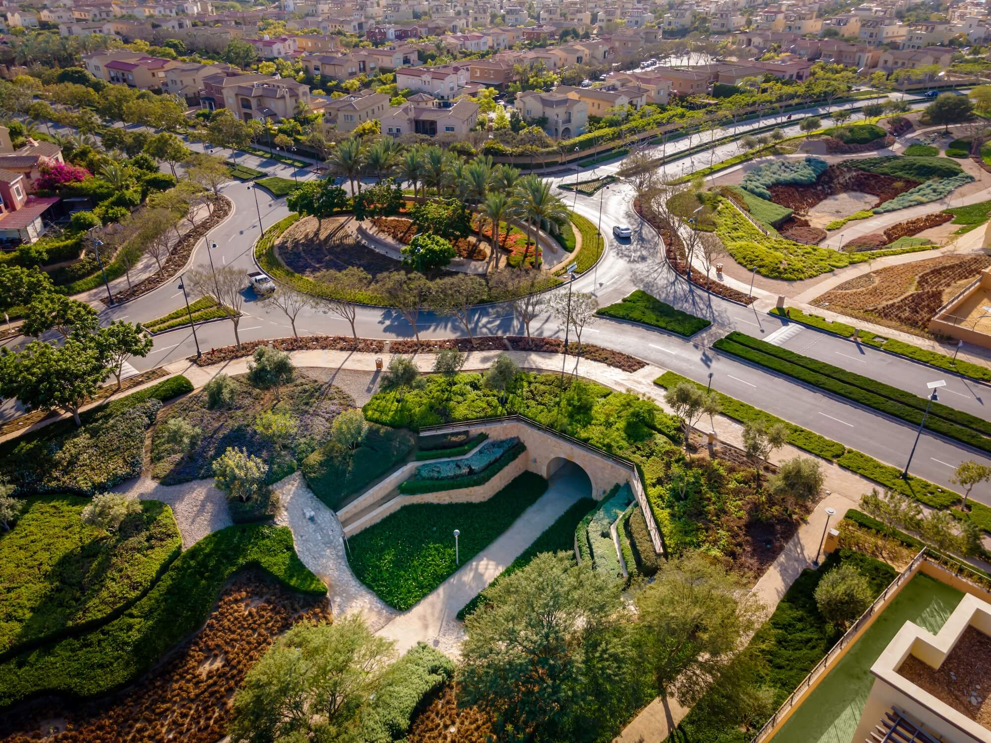 Landscaped streets and residential villas in Mivida, New Cairo